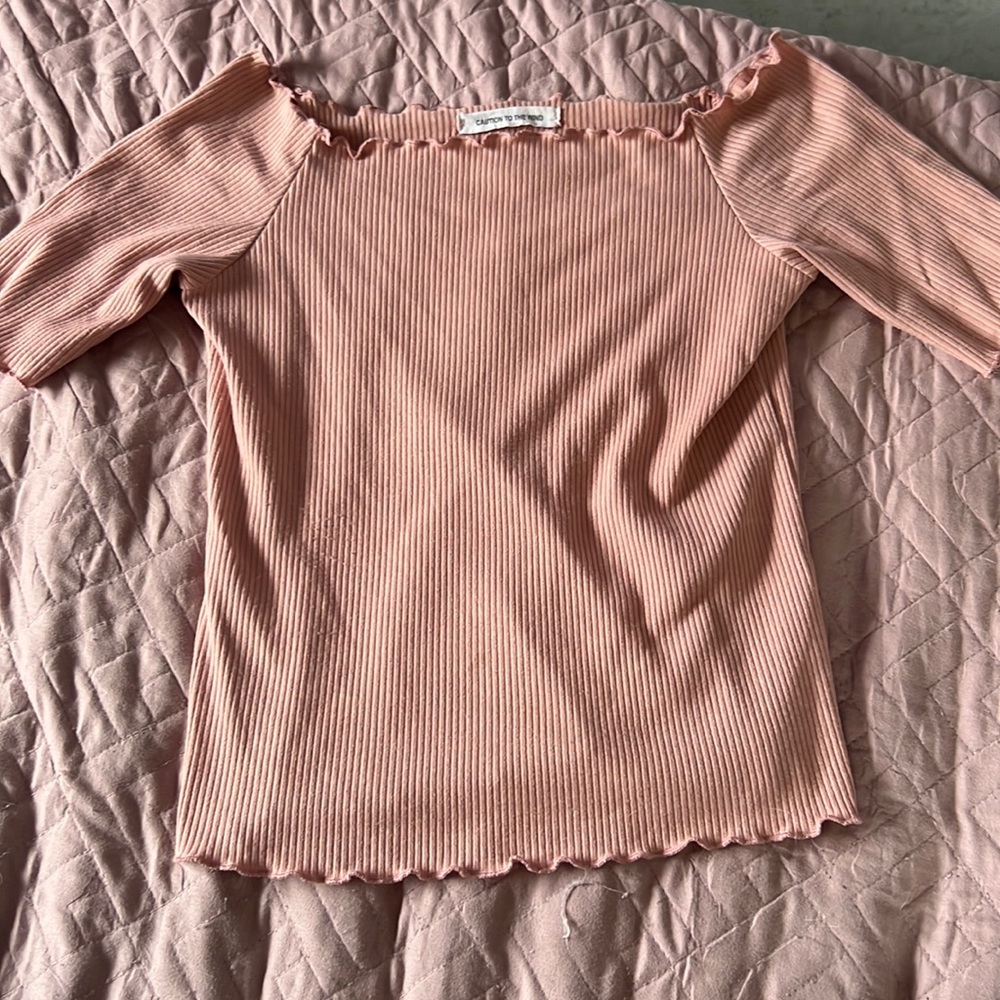 Caution to the wind off the shoulder shirt